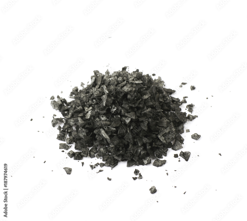 Pile of black salt crystals isolated Pile of black salt crystals isolated
