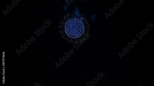 Amazing 4k shot of colorful bright illumination firework festival bursting explosion in dark night sky