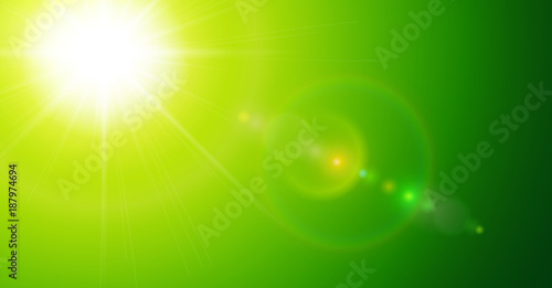Green sunny background, sun with lens flare