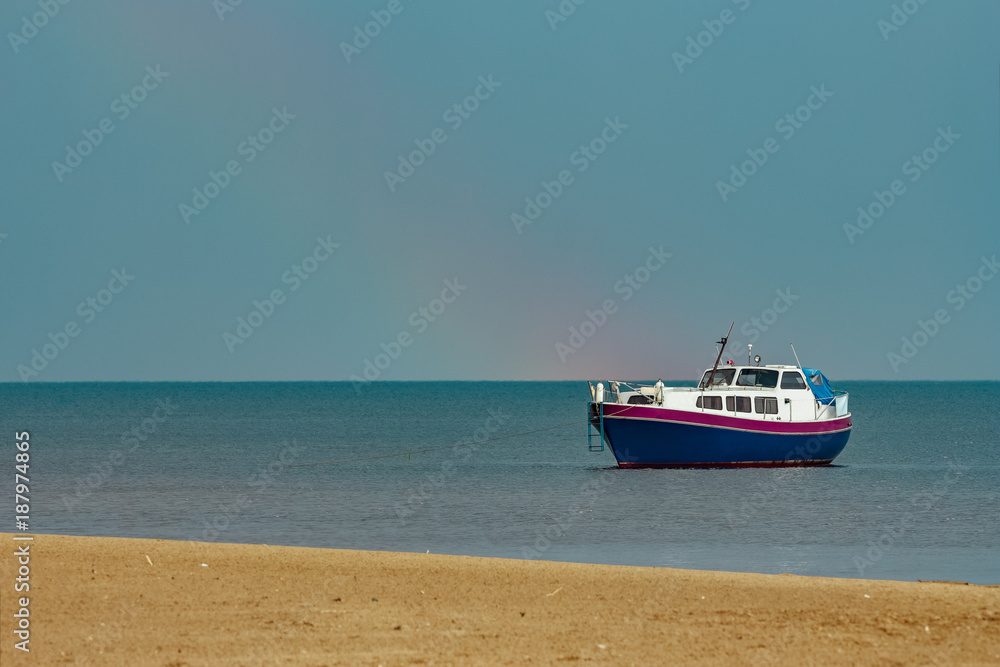 Small blue passenger ship