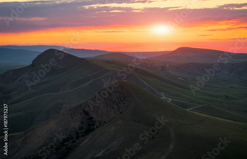 Mountain valley during sunrise. Natural summer landscape © es0lex
