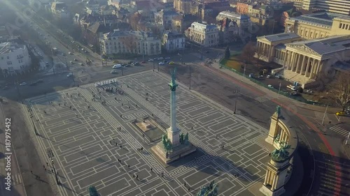 Budapest, Hungary - Aerial drone footage of famous Heroes' square and ice rink (Mujegpalya) and city park at sunset photo
