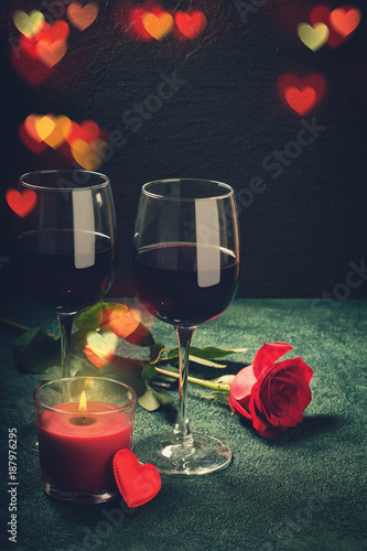 Valentines day greeting card concept. Wine glasses, rose and can