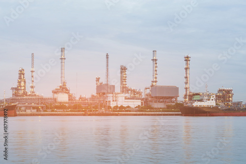 Refinery oil manufacture river front, industrial background
