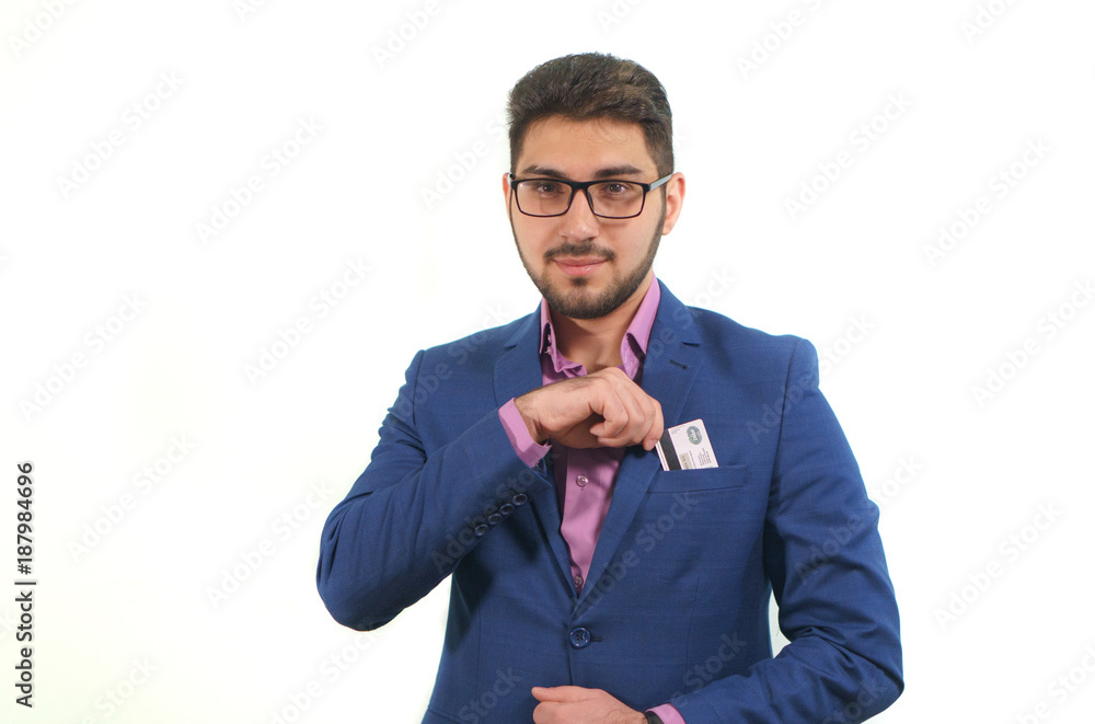 Young businessman with beard takes out a credit card from his pocket in business suit on white background Young businessman with beard takes out a credit card from his pocket in business suit on white background