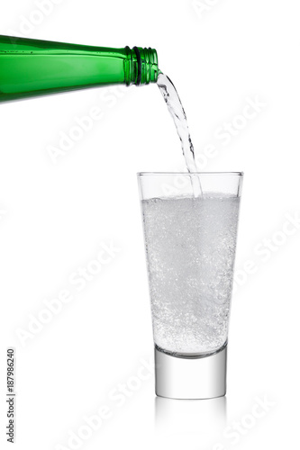 Wallpaper Mural Pouring lemonade soda drink from bottle to glass Torontodigital.ca