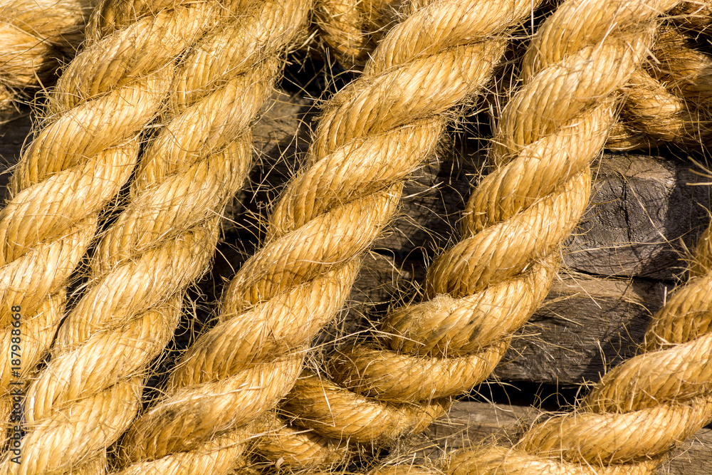 Thick rope to tie ship with a dock Thick rope to tie ship with a dock