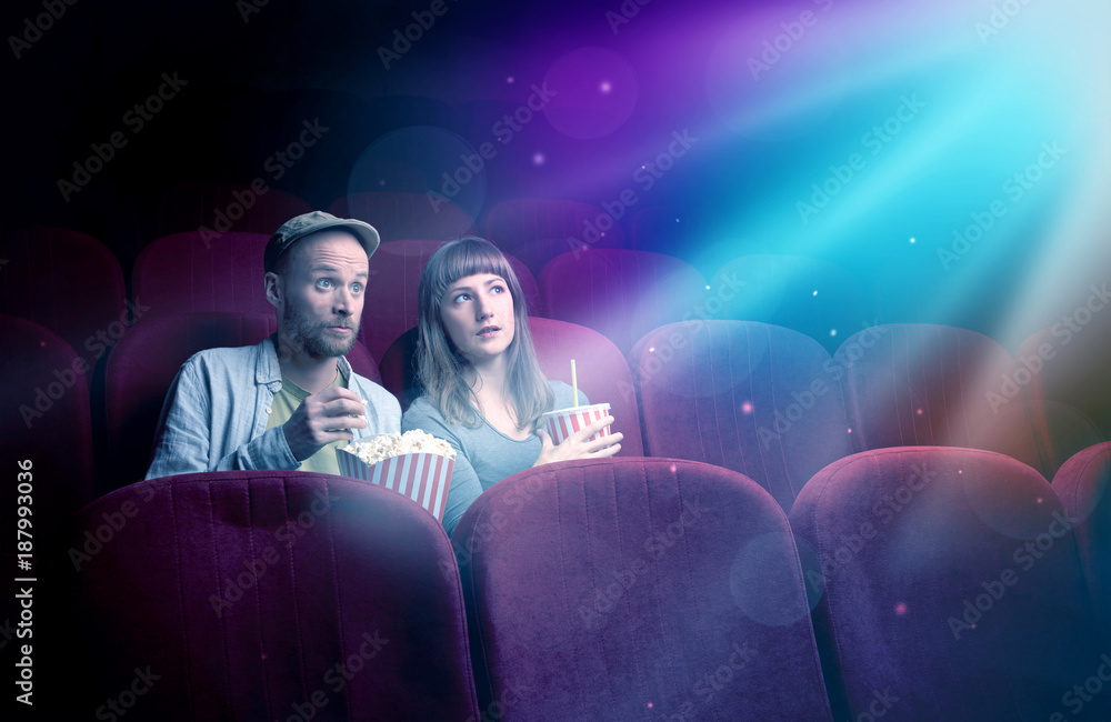Naklejka premium Teenager couple watching movie
