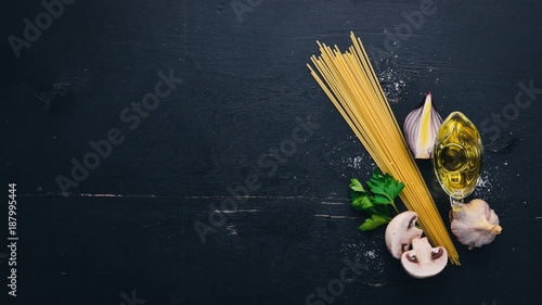 Spaghetti Italian Traditional Cuisine. On a wooden background. Top view. Copy space