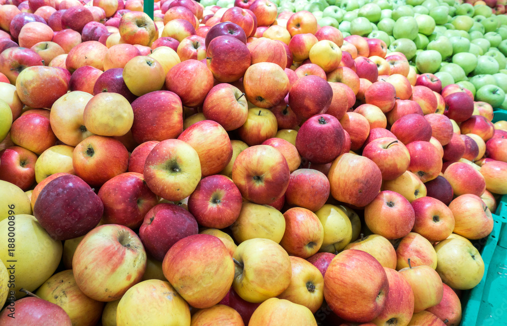 Apples on the market, a large fruit counter, ripe apples red, green Apples on the market, a large fruit counter, ripe apples red, green