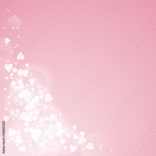 Falling hearts valentine background. Bottom left corner on pink background. Falling hearts valentines day delightful design. Vector illustration. © Begin Again