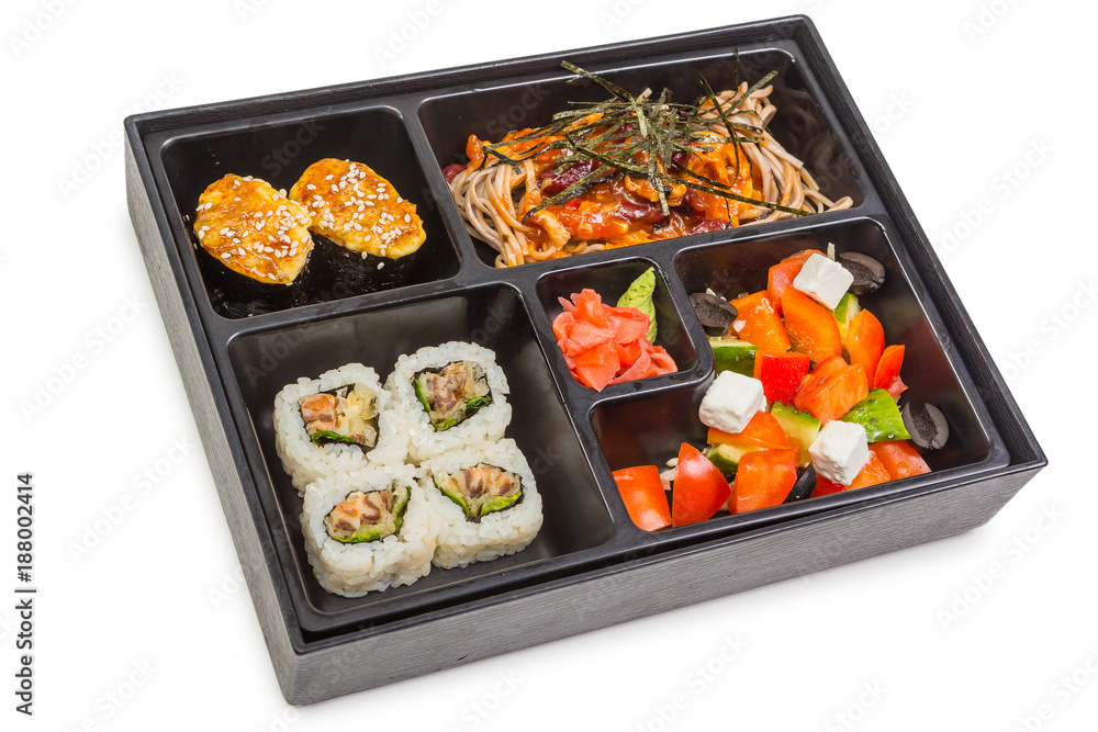Sushi and roll set in bento box with seafood isolated on white background. Japanese cuisine. Sushi and roll set in bento box with seafood isolated on white background. Japanese cuisine.