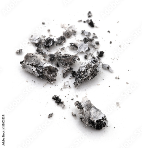Cigarette ash isolated on white background with shadow reflection. Ash from cigarette isolated on the white background. Smoking waste. Cigarette waste.