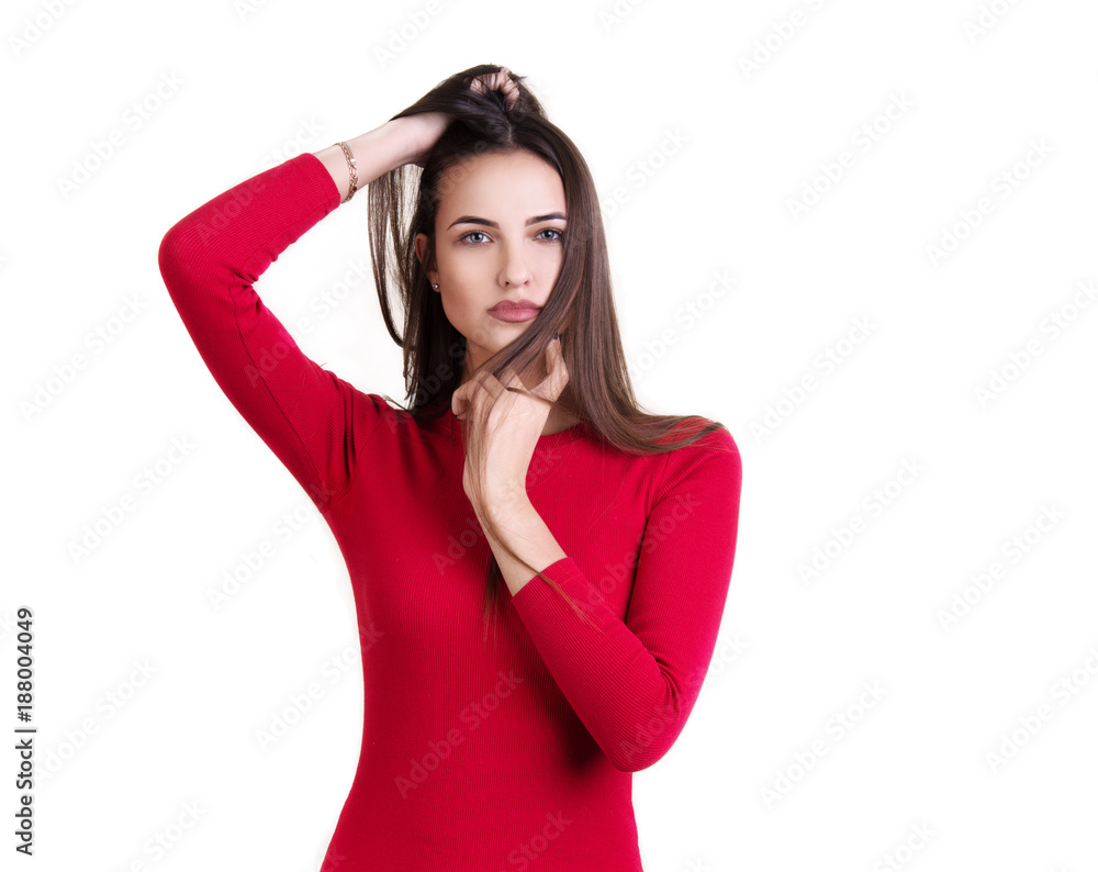 Young woman in red dress posing Young woman in red dress posing