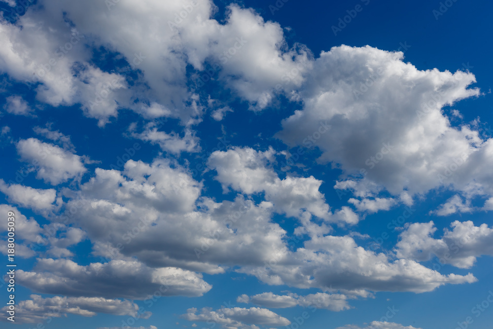 Fototapeta premium Beautiful blue sky with white clouds. Wide angle view.