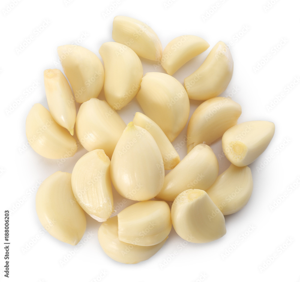 Garlic cloves on white background Garlic cloves on white background
