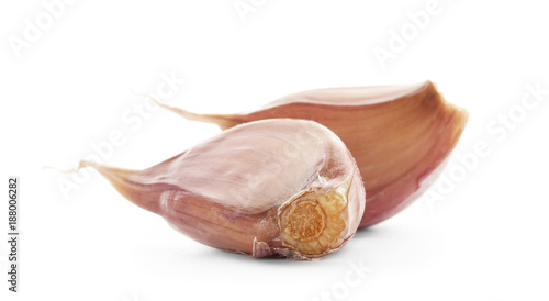 Fresh garlic cloves on white background