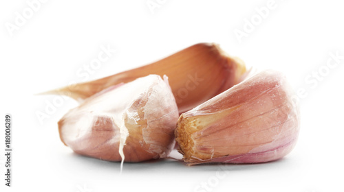 Fresh garlic cloves on white background