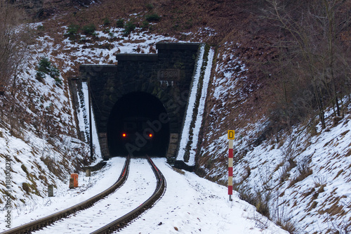 A personal train enters the tunnel