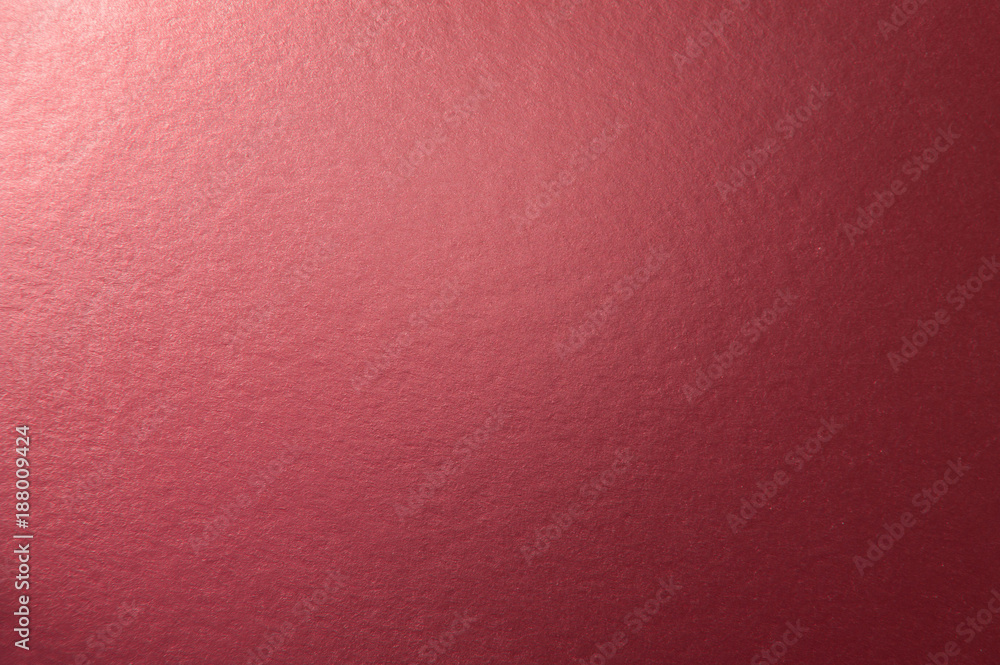 Texture of red metallic paper background for design Christmas or New Year's party cards Texture of red metallic paper background for design Christmas or New Year's party cards