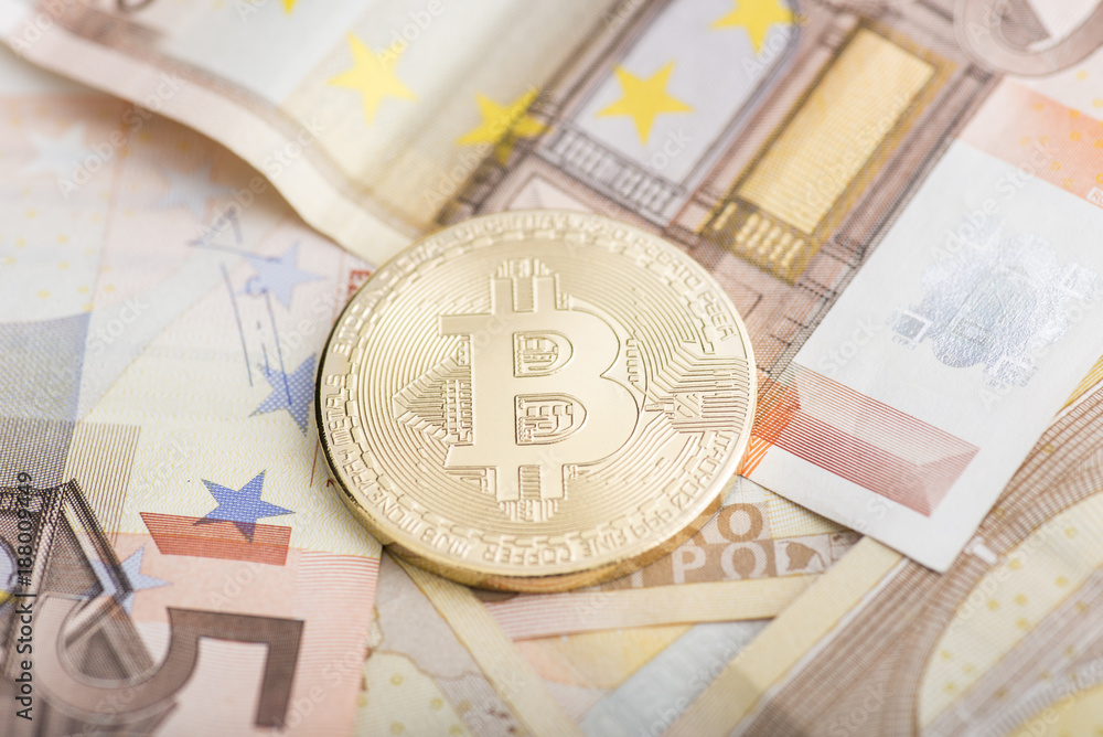 Bitcoin macro shoot on money background Bitcoin macro shoot on money background