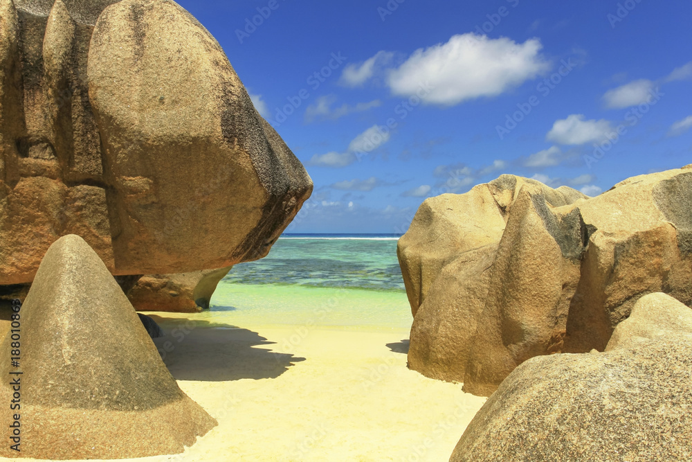 Sandy beach with big rocks