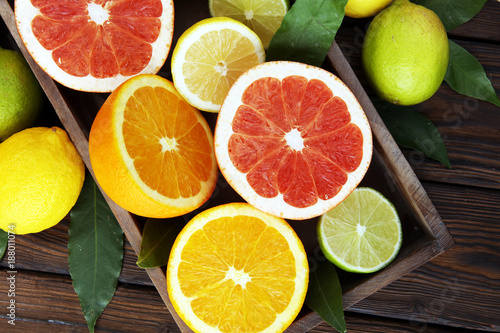 Citrus background. Assorted fresh citrus fruit. Lemon  orange lime  grapefruit. Fresh and colorful concept.