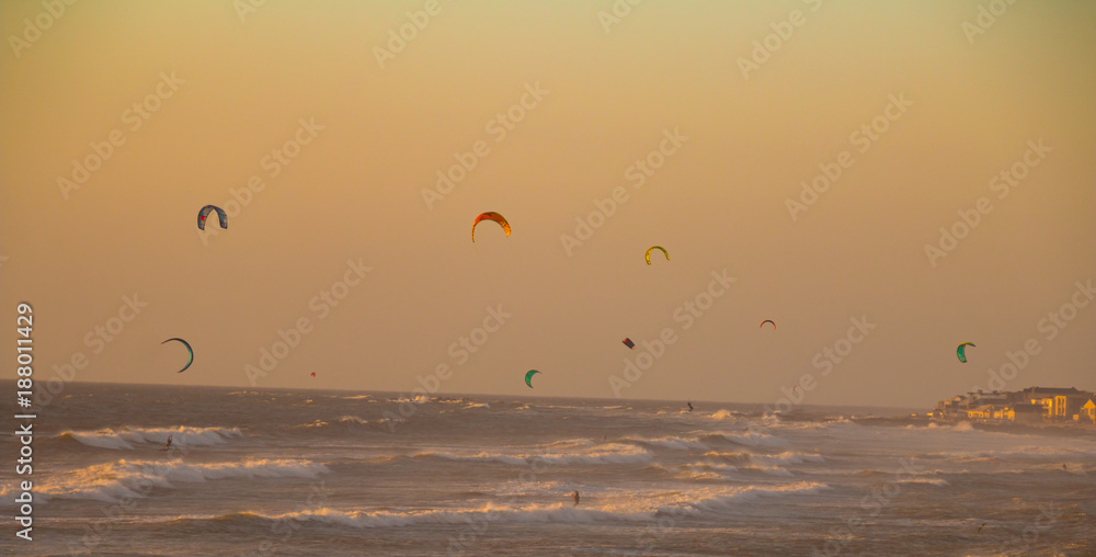 Kite surfing in beautiful sunset