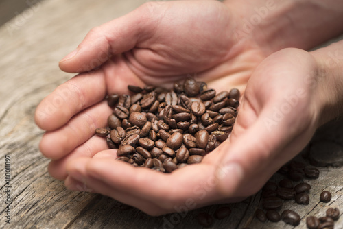 Hands Holding Coffee Beans