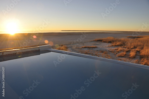 The champagne-poolo of Onkoshi Camp with breathtaking view over the Etosha Saltpans