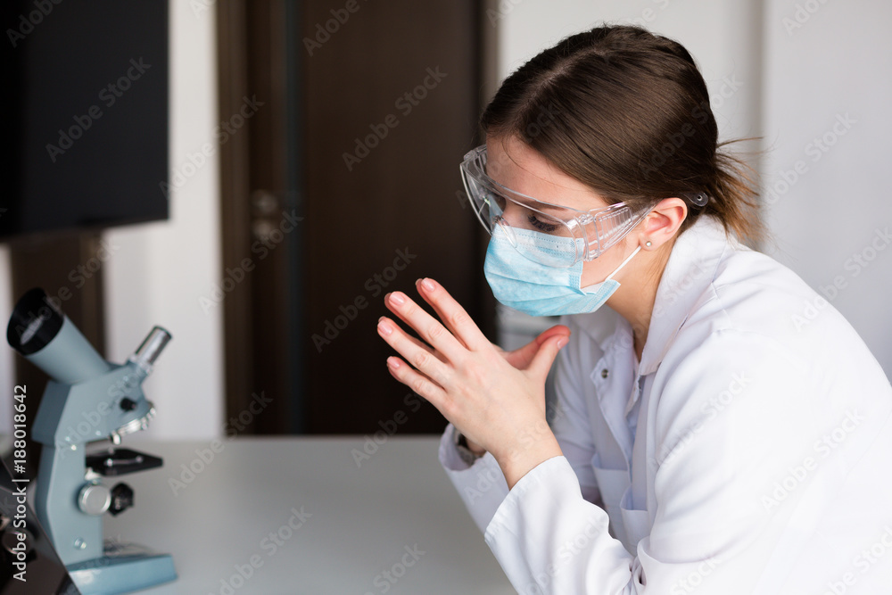 Woman doctor working in the lab