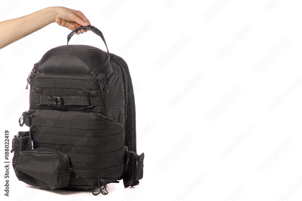 Photo of a backpack in hand Photo of a backpack in hand
