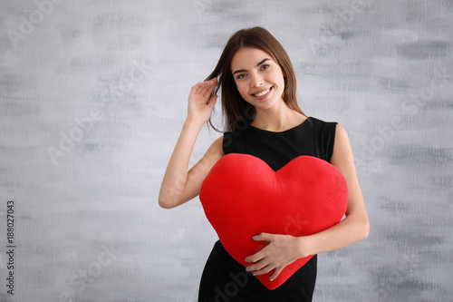 Romantic young woman with h...