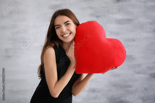Romantic young woman with h...
