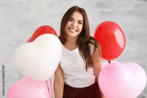 Romantic young woman with h...