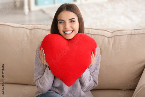 Romantic young woman with h...