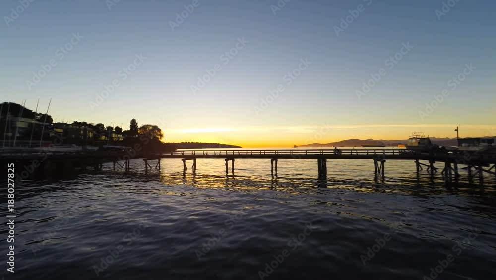 Aerial drone shots of flying through the docks at sunset Aerial drone shots of flying through the docks at sunset