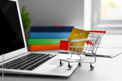 Laptop, mini market trolley...