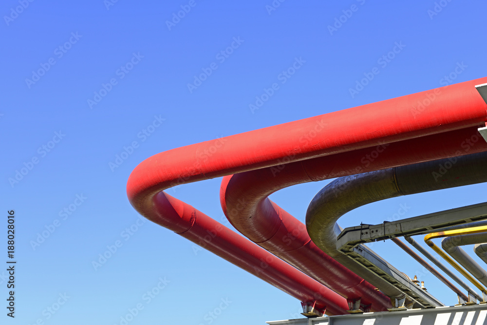 Oil pipeline close-up, under the blue sky Oil pipeline close-up, under the blue sky