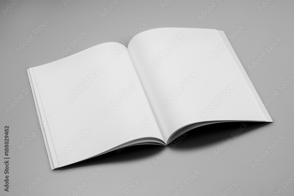 Mock-up magazine, book or catalog on gray table. Blank page or notepad on solid background. Blank page or notepad for mockups or simulations. Mock-up magazine, book or catalog on gray table. Blank page or notepad on solid background. Blank page or notepad for mockups or simulations.
