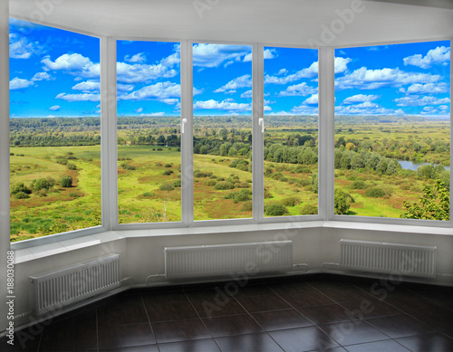 Window with view to the summer landscape © alexmak