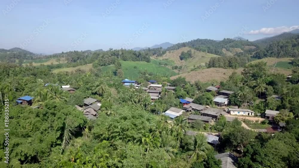 Aerial View, Flying over the mountains and trees with beautiful clouds and sky in sunrise,Landscape nature with aerial camera shot,Tak Thailand. Aerial View, Flying over the mountains and trees with beautiful clouds and sky in sunrise,Landscape nature with aerial camera shot,Tak Thailand.