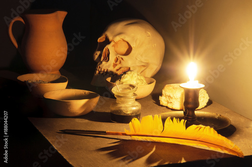 Masonic reflection chamber with alchemic symbols: the skull, the pen, the salt, the mercury, the sulphur photo