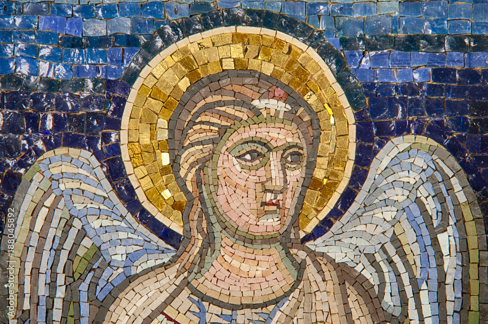 A mosaic of an angel. The mosaic is modern , resembling an ancient decoration.