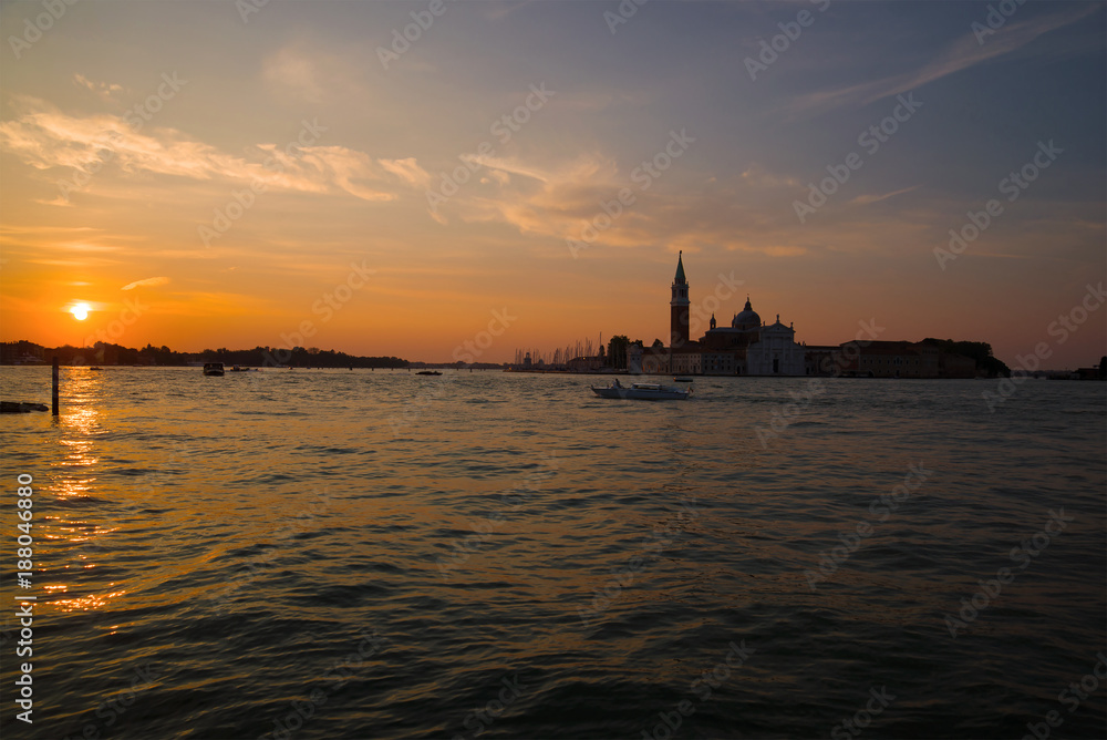Sunrise in the bay of San Marco overlooking the Cathedral of San Giorgio Maggiore. Venice, Italy