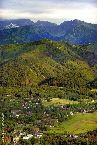 Poland, Tatra Mountains – Panoramic view of Zakopane town with Kasprowy Wierch, Skrajna Turnia and Swinica peaks in the background