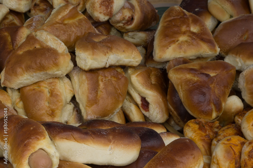 Image of a lot of sweet croissants in supermarket bakery . Image of a lot of sweet croissants in supermarket bakery .