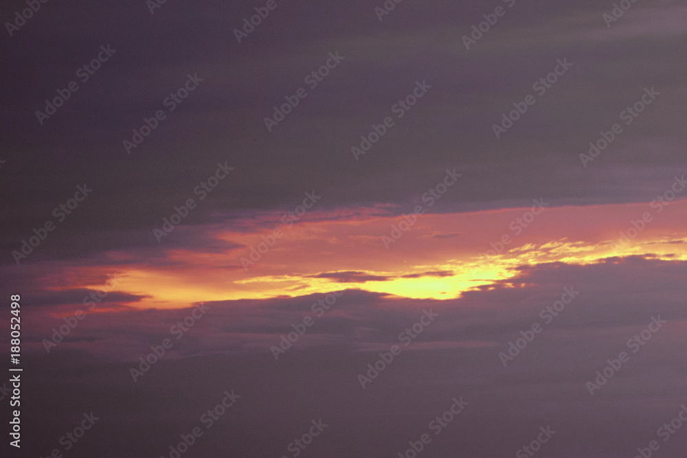 orange the evening clouds dark and the last light