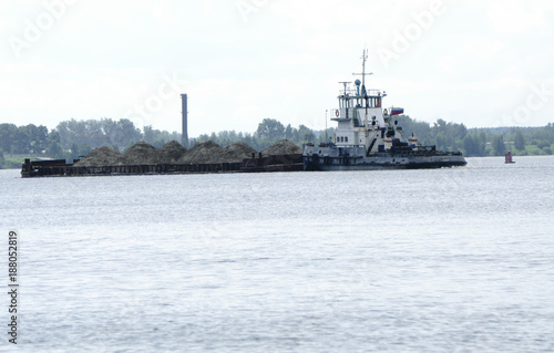 Russian barge with sand on the river to cope © baon