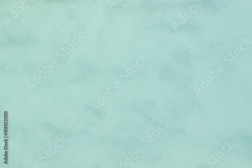 A background abstraction of water motion mixed with clouds and fog. Image displays a pleasing paper grain and texture when viewed at 100 .